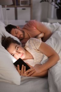 woman texting affair